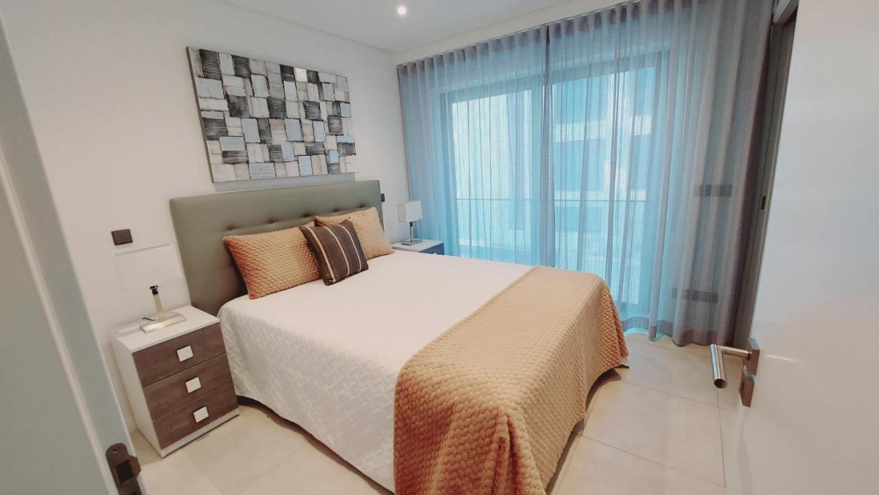 Apartamento Meerblick Quarteira Esterno foto